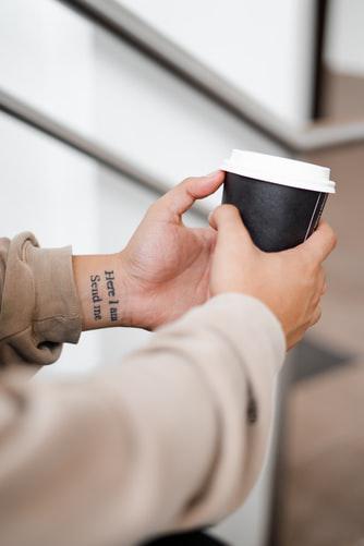 Hands holding cup image